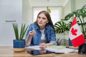 Female teenager sitting at home and participating in online training