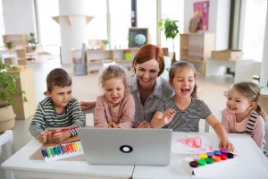 Nursery school children with teacher