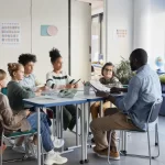 Male tutor teaching group of kids